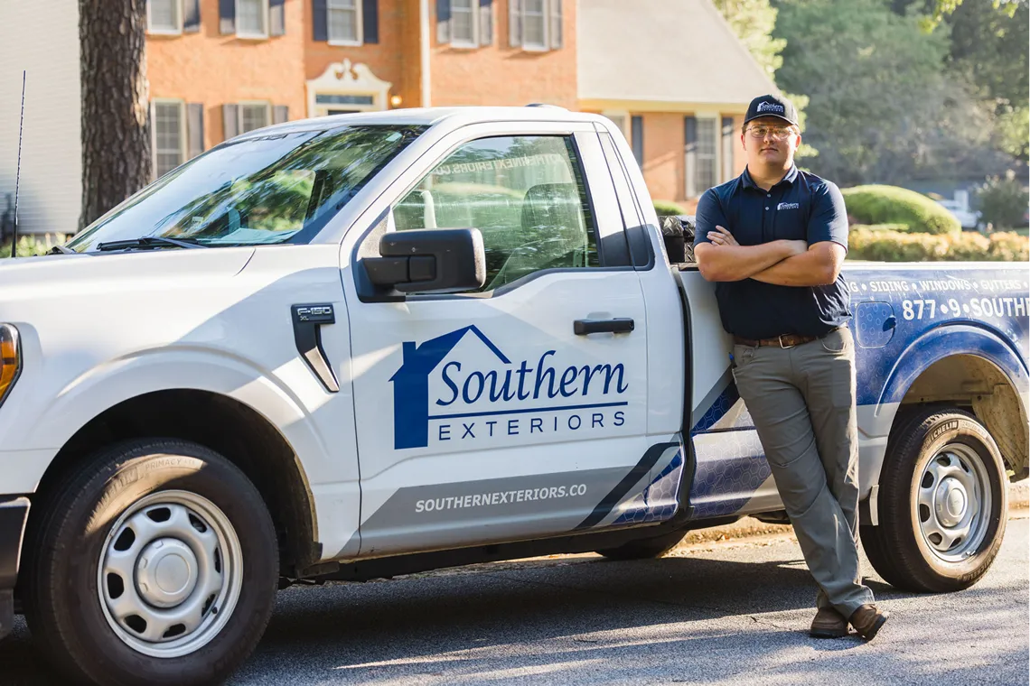 Southern Exteriors project manager with branded truck